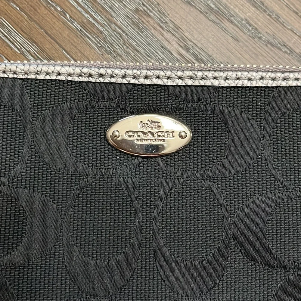 Coach black signature silver metallic leather edge wristlet